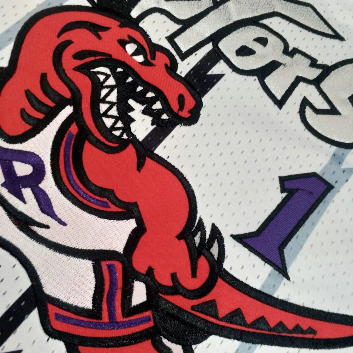 Regata Authentic Toronto Raptors Mitchell & Ness Hardwood Classics Branca 1998-99